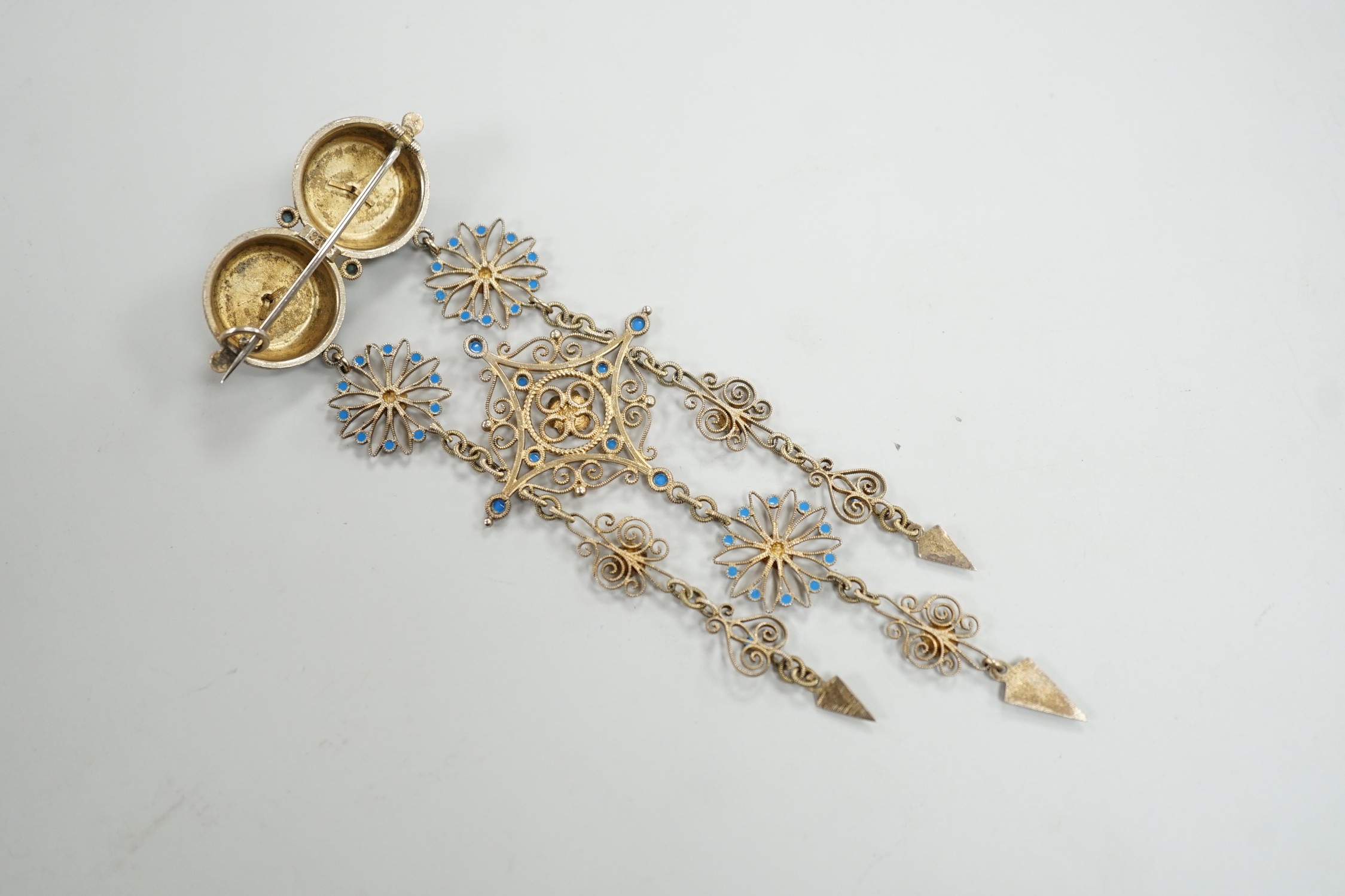 An early 20th century Scandinavian 830s gilt white metal and three colour enamel set drop brooch, 11cm, gross weight 16.3 grams.